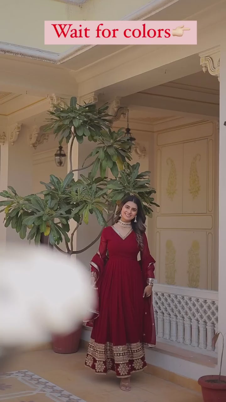 Women embroideried georgette gown with net dupatta